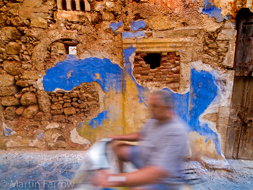 Ruins 
 Ruined building with passing biker 
 Keywords: Crete, Greece,ruin,building,derelict,man,bike,biker,passing,blue