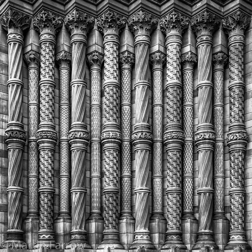 Carved stone pillars 
 Decorative stone pillars 
 Keywords: carved,pillar,stone,ornate,pattern,mono,support,repetition