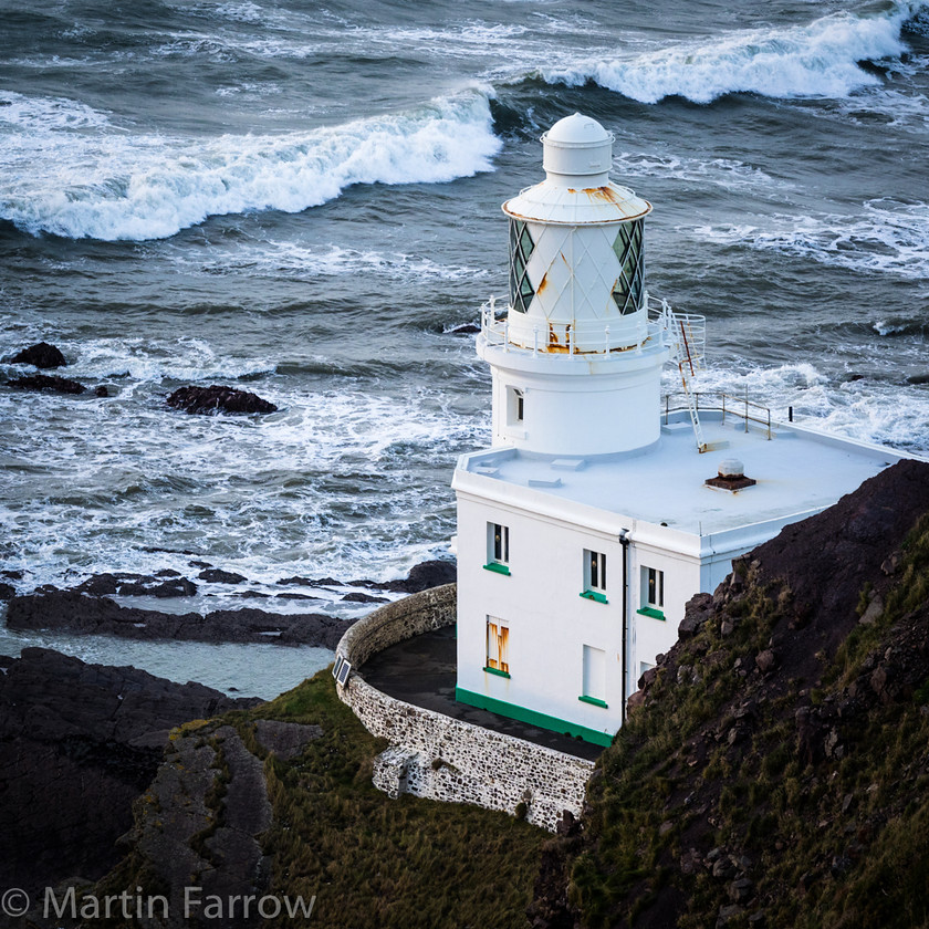 Hartland-Lighthouse 
 Lighthouse at Hartland Point 
 Keywords: Devon, Hartland, North Devon, lighthouse,water,waves,foam,rough,cold,cliff,sea,ocean,guide,protection,safety