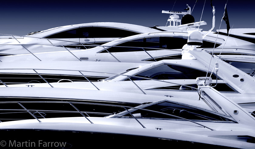 Sunseekers-mono 
 Row of powerboats 
 Keywords: boats, mono,power,powerboat,luxury,sleek,yacht