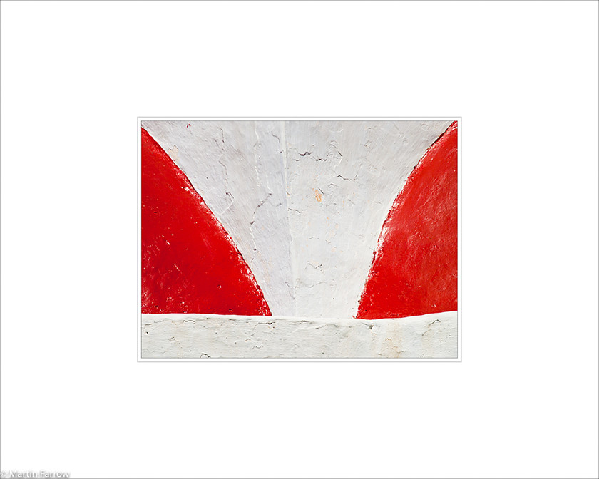 13 Red-and-White 
 Red triangles of domes on white wall 
 Keywords: ARPS panel fine art white simple abstract graphic architecture red wall dome triangle symmetry church Mykonos island Greece