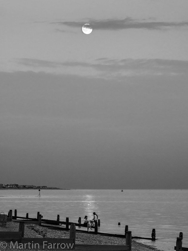 Moonlight 
 Moon over shore 
 Keywords: Cheers, Hill Head, beach, evening, sunset,moon,shore,mono,sea,reflection,coast,groynes,evening